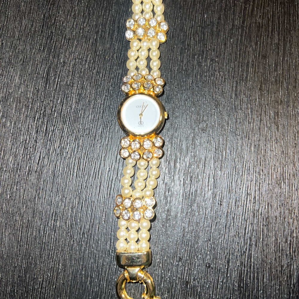Vintage Gucci (Authentic) - Elegant Gold and Pearl Women's Watch